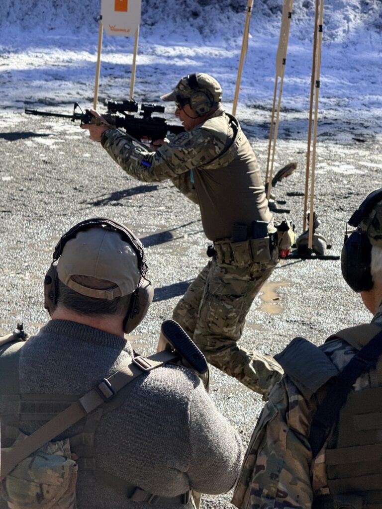 55th Light Foot member demonstrating field movement and safety techniques during outdoor preparedness training in Northern Idaho.