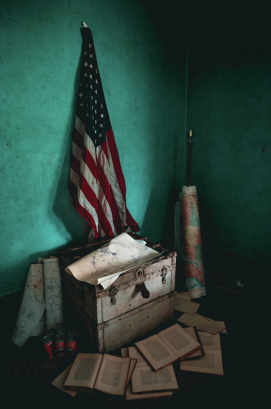 Code of Conduct image with American flag, maps, books, and documents symbolizing civic duty, preparedness, responsibility, and organizational standards.