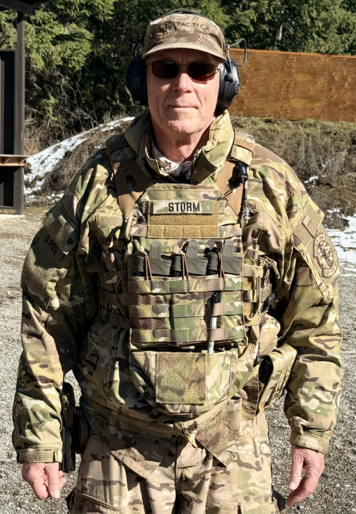Storm, Commanding Officer of the 55th Light Foot Battalion in Northern Idaho, wearing the organization's multicam field uniform during leadership and training activities.
